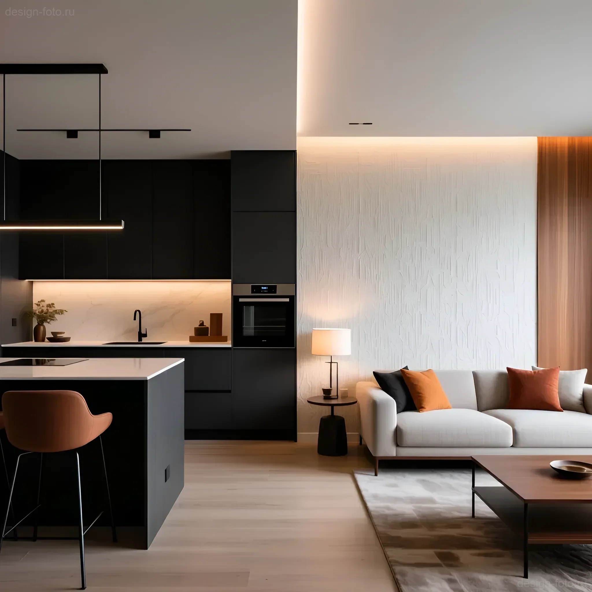 Современная кухня-гостиная: черные матовые фасады кухни против бежевого дивана и акцентной стены